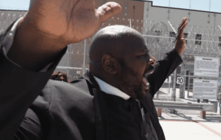 The Rev. Ben McBride lead protestors against U.S. immigration policy separating parents from their children - June 23, 2018 outside a detention center in San Diego, California. (Robyn Beck / AFP vai Getty Images)